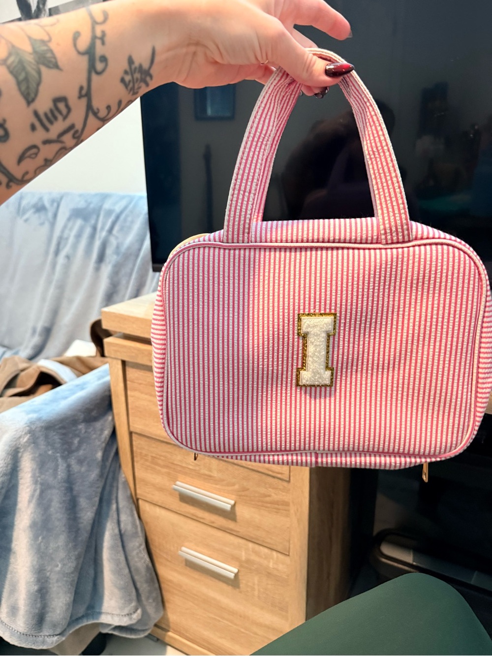 Pink Striped Handheld Cosmetic Bag with Gold 'I' Accent